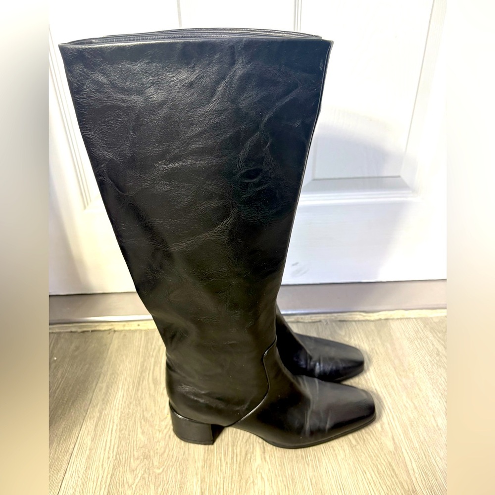 Sleek Black Leather Heeled Boots